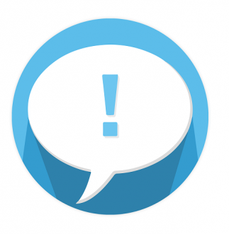 Exclamation mark within a speech bubble